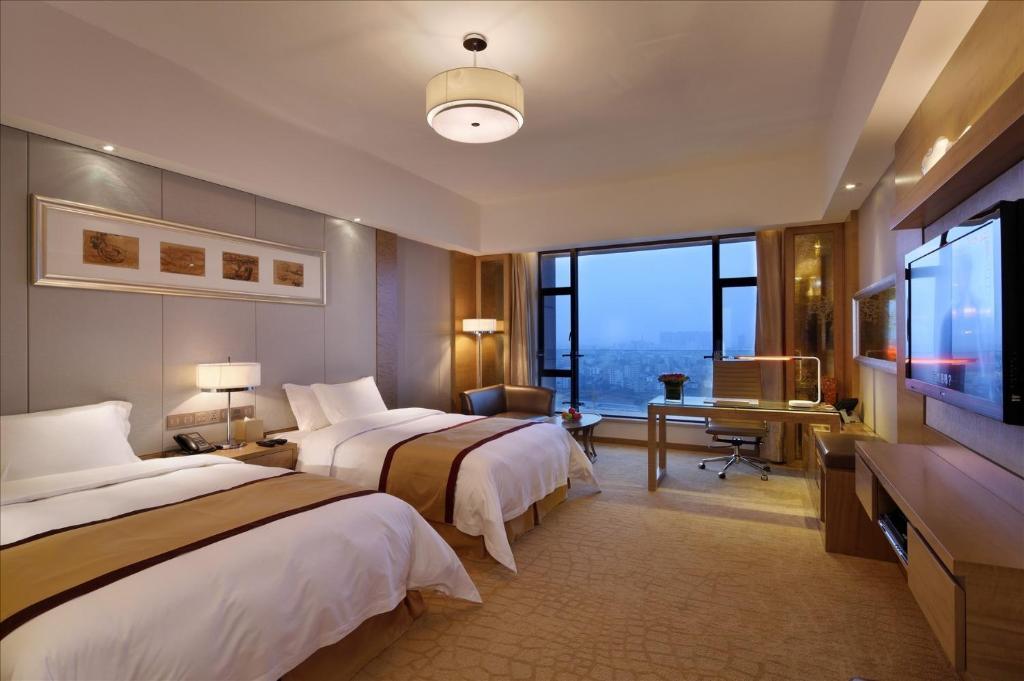 Sovereign Hotel Zhanjiang Rom bilde